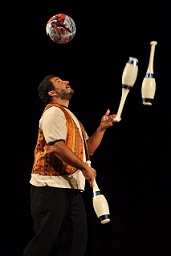 Head bouncing a ball while juggling